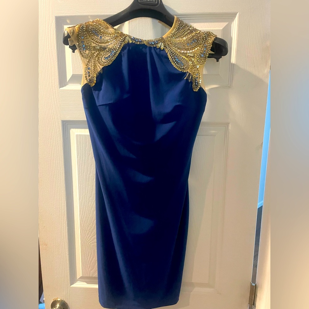 A gorgeous royal blue embellished backless dress